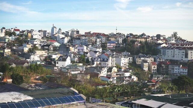 Vietnam, Da Lat Sunlit Da Lat Neighborhood With Clustered White Houses And Red Roofs, Urban Hillside Mosaic With Solar Roofs And Streets, Bright Clear Sky And Distant Ridges, Lively Travel