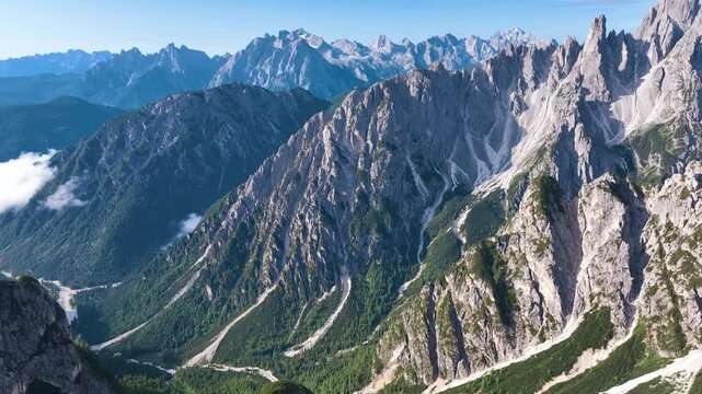 A scenic view of the Dolomites mountain range in Italy.