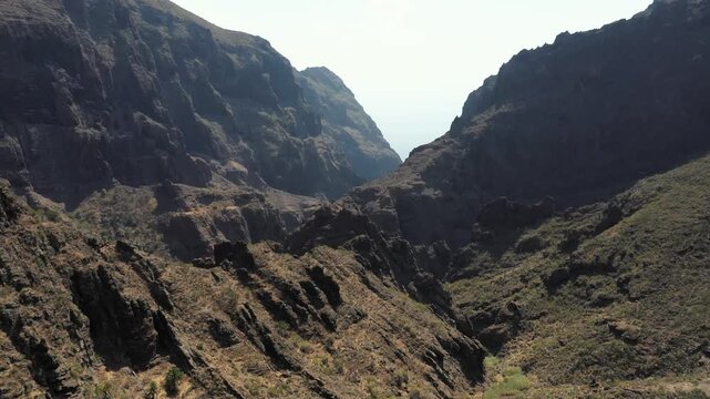 Masca Valley aerial with cliffs and ocean horizon, Tenerife, Spain