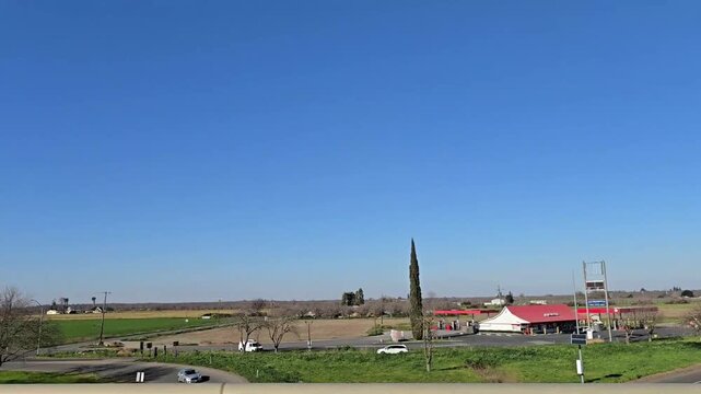 Traveling from Dixon on partial cloverleaf interchange toward Interstate 80 West to San Francisco.