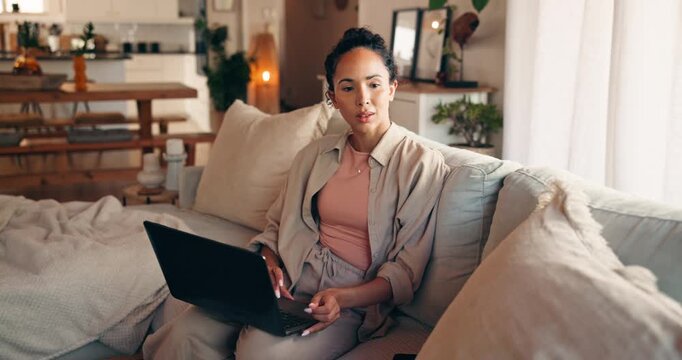 Thinking, freelancer and woman with laptop, lounge and creative for story on website and journalism. Reporter, reflection and person with tech for article on couch, typing and remote work in house