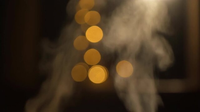 Aromatherapy diffuser and candle creating a relaxing atmosphere. 4k Footage Video