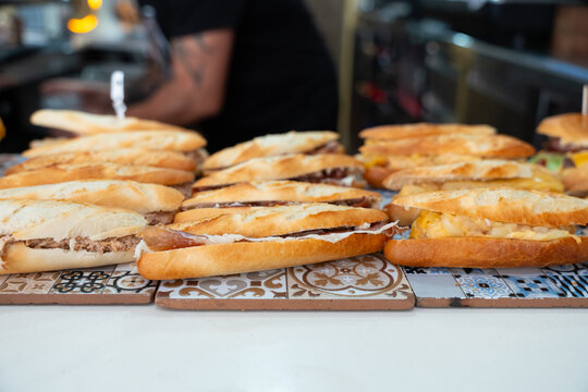 Displaying traditional spanish bocadillos on a cafe counter
