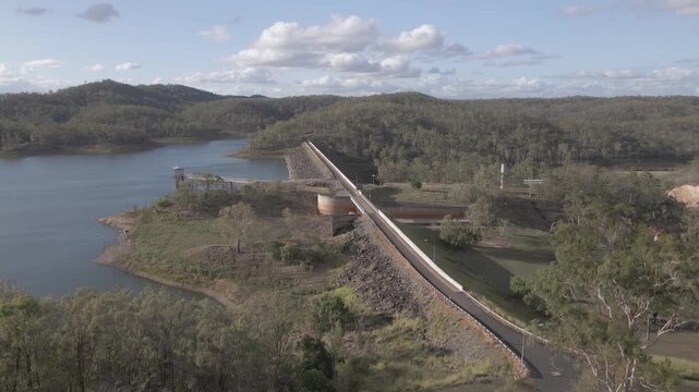 Fly up aerial of Fred Haigh Dam in queensland Australia
