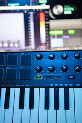 Professional Music Production Studio Setup with MIDI Keyboard and DAW Interface