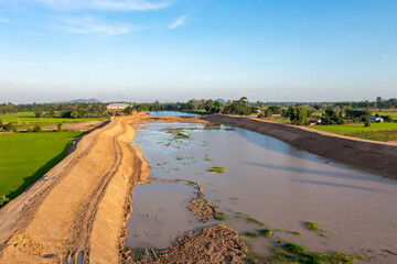 Construction dredges up for a canal and dam, to prevent a flood in the rainy season. Date on 14 May...