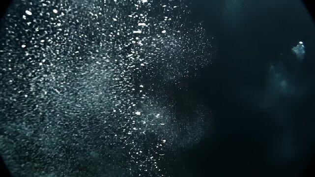 Abstract dark background with scattered bright particles, illuminated, textured