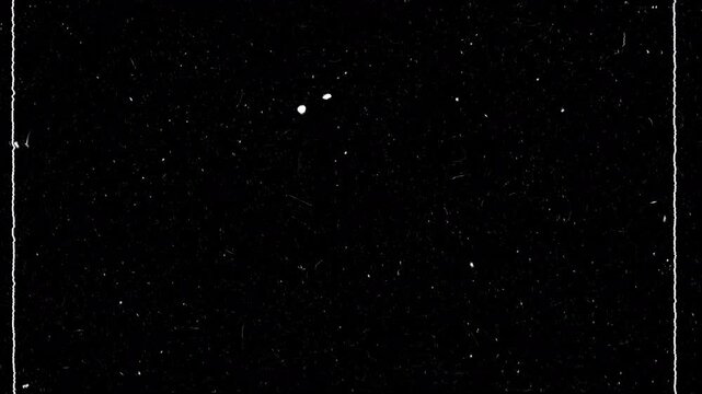 Vintage Super 8mm film grain overlay in 4K with dust, scratches and noise texture. Seamless loop retro cinema effect for opacity or screen mode, perfect for nostalgic video looks.