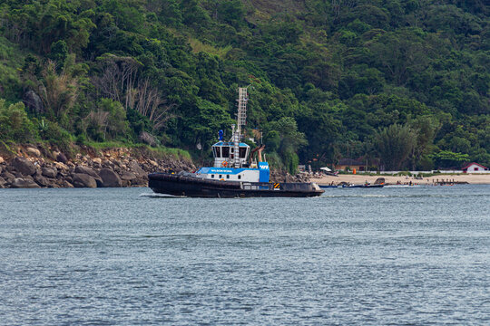 Santos, SP, Brazil - January 17 th, 2026: Wilson Sons' Hamal tugboat sailing off G&oacute;es Beach in Guaruj&aacute;.