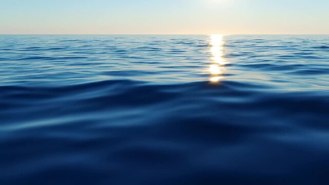 Ocean at sunset with sun reflection