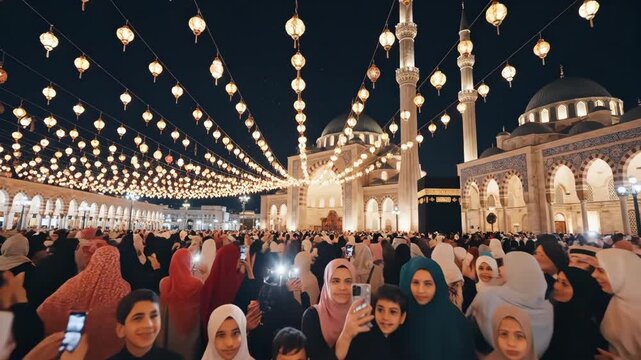 Muslims gather for evening prayers at a mosque during Ramadan, illuminated by festive lights.