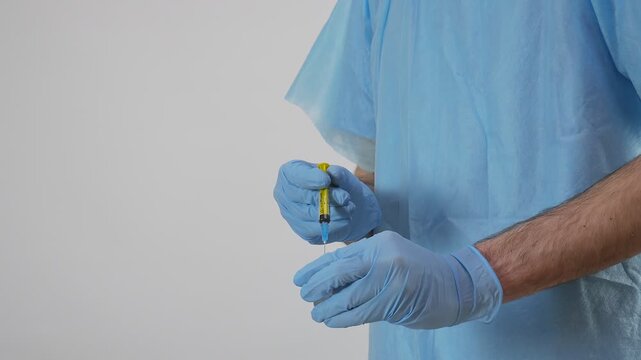 Healthcare Worker Holding Syringe Close Up