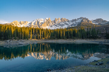 Fototapeta premium Sunset view of Lago Carezza during spring time, Dolomites, Italy.