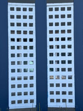 Iconic dark blue and white breeze block mid-century modern bricks from 1960s and 1970s background