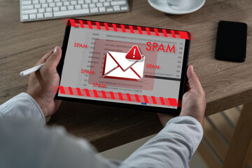 Cyber attack and spam mail concept System hacked warning malware warning on tablet screen, representing hacked system alerts, spyware detection, network security, safe email