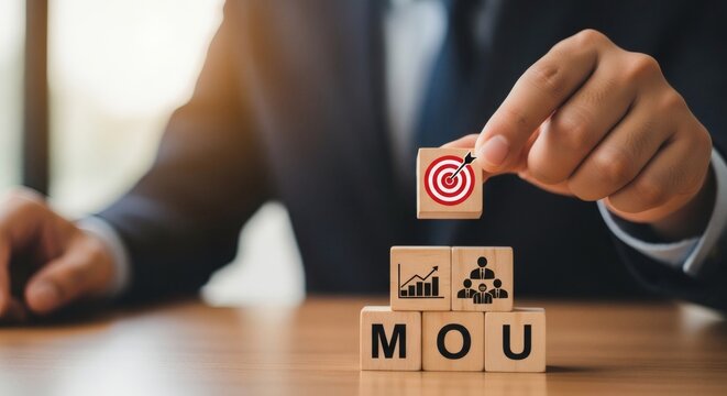 Aiming MOU Blocks symbolize business goals with growth, collaboration, and deal.
