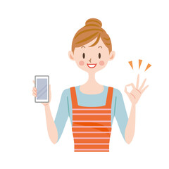 スマートフォンを持ってオッケーサインを出す主婦
