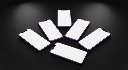 Multiple mobile devices arranged in a circular pattern on a dark surface illuminated by spotlights from above