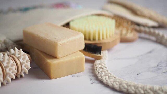 Natural soap and brush setup on marble table
