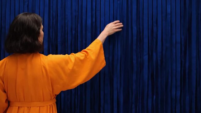 Woman in orange dress interacting with blue curtain, marketing background, advertising visual, corporate branding illustration, business presentation design, website hero banner