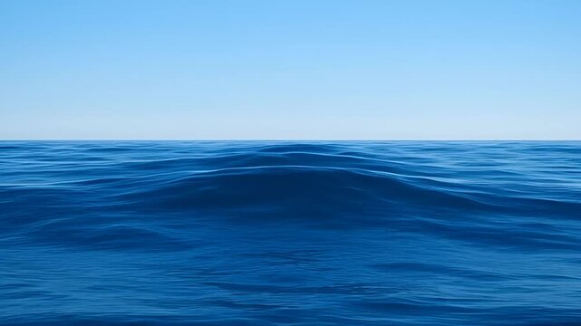 Overcast ocean swell background with slow broad wave rhythm and stable horizon