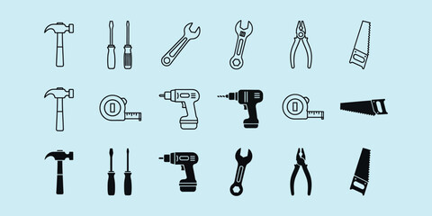 Obraz premium Black and white tools on light blue background hammer screwdrivers