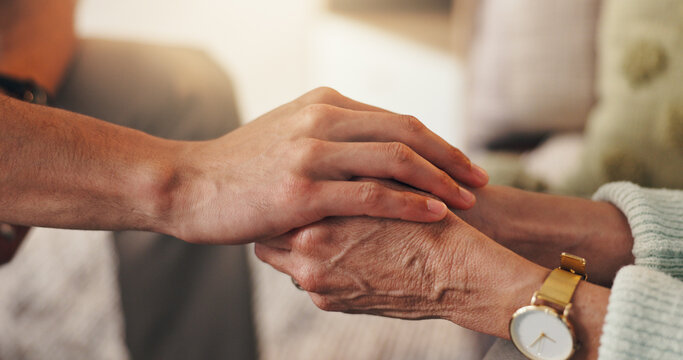 Therapist, patient and holding hands in clinic with empathy, consultation and compassion for grief. Psychologist, person and support in appointment with trust, counseling help and sympathy for loss.