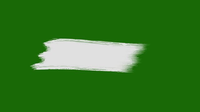 white paint or ink brush stroke on a green background, The stroke has a grunge or textured appearance, typical of dry brush techniques, Grunge hand drawn watercolor texture, Rough Edges. Paint Brush