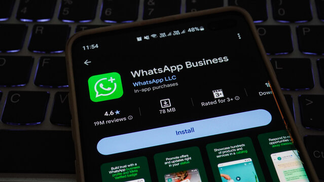 WhatsApp Business dev application on Smartphone screen. WhatsApp Business is a freeware web browser developed by WhatsApp Inc