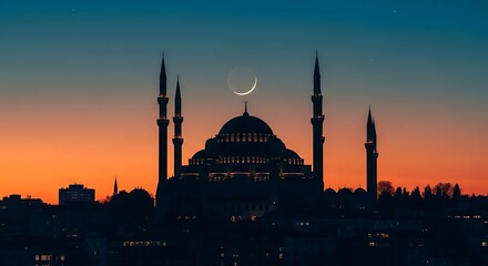 Fototapeta premium Silhouette of a mosque at sunset.