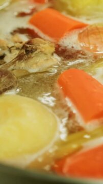Close-Up of Simmering Pot with Veget