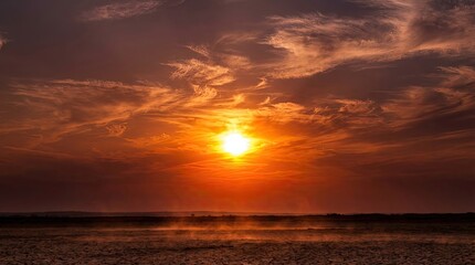 Sky with bright sun and extreme global climate concept. Stunning sunset over tranquil lake with vibrant colors and clouds.