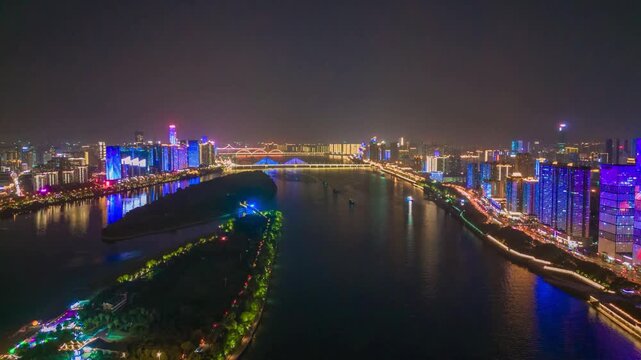Changsha Night Cityscape with Illuminated Xiangjiang River and Colorful Light Show