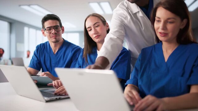 Medical Students Engaged In Lesson