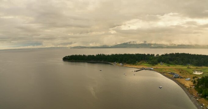 Panoramic Aerial View Above Eliza Island Looking Toward Bellingham Washington Under Cloudy Sky