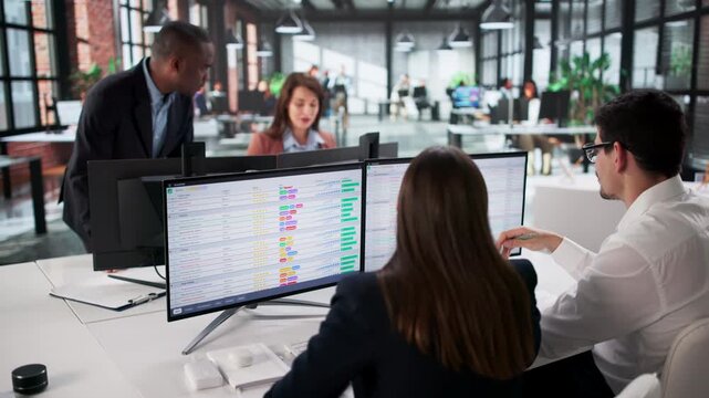 Data Analyst Working With Business Team On Computer