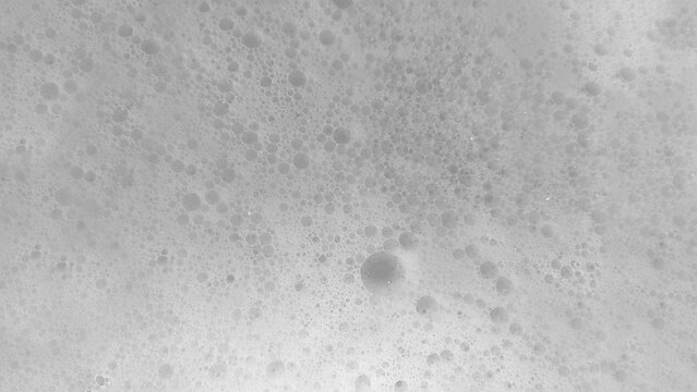 石鹸や洗剤などの一面が細かな泡と大小様々な泡の画像素材　背景・テクスチャー　16:9・8K UHDサイズ（7680 x 4320）ホワイト・ライトグレー・灰色・白・グレースケール