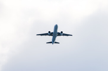 Fototapeta premium Airplane in the sky. Air travel. 