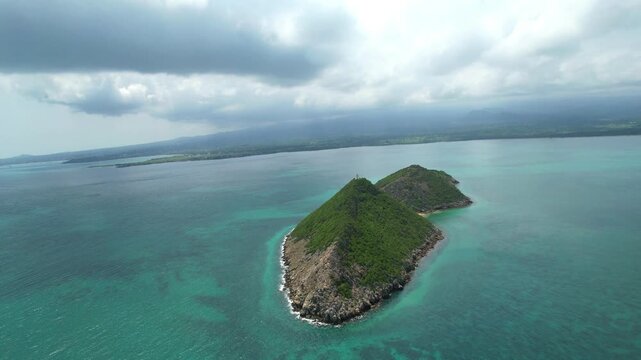 Aerial view behind from ilheu das cabras in S&atilde;o Tom&eacute;,Africa.
backwards Drone shot