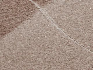 Fototapeta premium Close-up shot of a textured, light brown surface background
