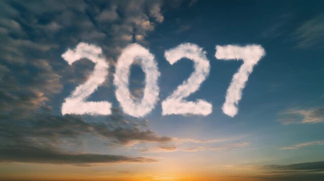 2027 Year Written in Clouds in Blue and Orange Sunset Sky Concept