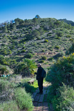 Man walking through the mountains
