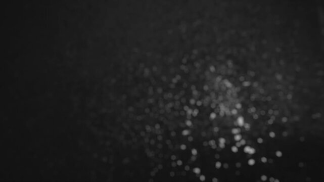 Ethereal Abstract Bokeh Pattern in Monochrome Illuminating the Night Scenes