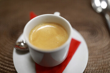 White cup of fresh espresso coffee