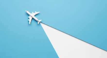 White airplane model on blue background with white runway
