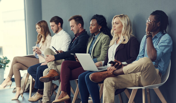 Recruitment, queue and people with technology in waiting room, interview preparation and opportunity. Diversity, laptop and applicant group with phone for online hiring tips, job search and hr office
