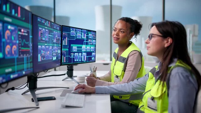 Female Engineer Operates SCADA System