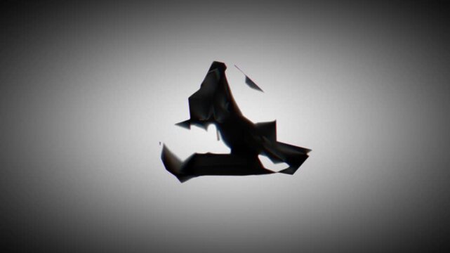 Dark angular form with sharp edges and faceted geometry floating centrally over a gradient gray background, creating a bold conceptual visual