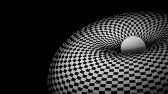 Black and white abstract 3D torus covered in a checkered pattern with a smooth sphere placed at the center opening against a dark background