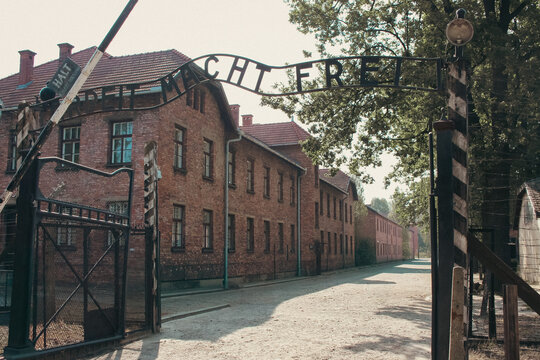 Gate to concentration camp Auschwitz, Oswiecim. Entrance to Auschwitz death camp. Holocaust memorial. Symbol of fascism violence. Jewish genocide.